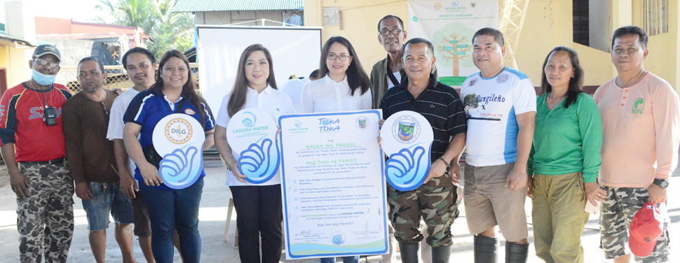 Laguna Water, in coordination with DILG IV-A, partners with the Local Government of Pangil in protecting the environment and ensuring pristine quality of their water systems. In photo: Laguna Water Stakeholder Relations Managers, Ana Martir (5th from left) and Dianne Marie Cunanan (6th from left); Pangil Mayor Oscar Rafanan (4th from right); and Pangil Vice Mayor Alfredo Pajarillo (3rd from right);  representatives from DILG IV-A; and barangay chairpersons of Pangil.