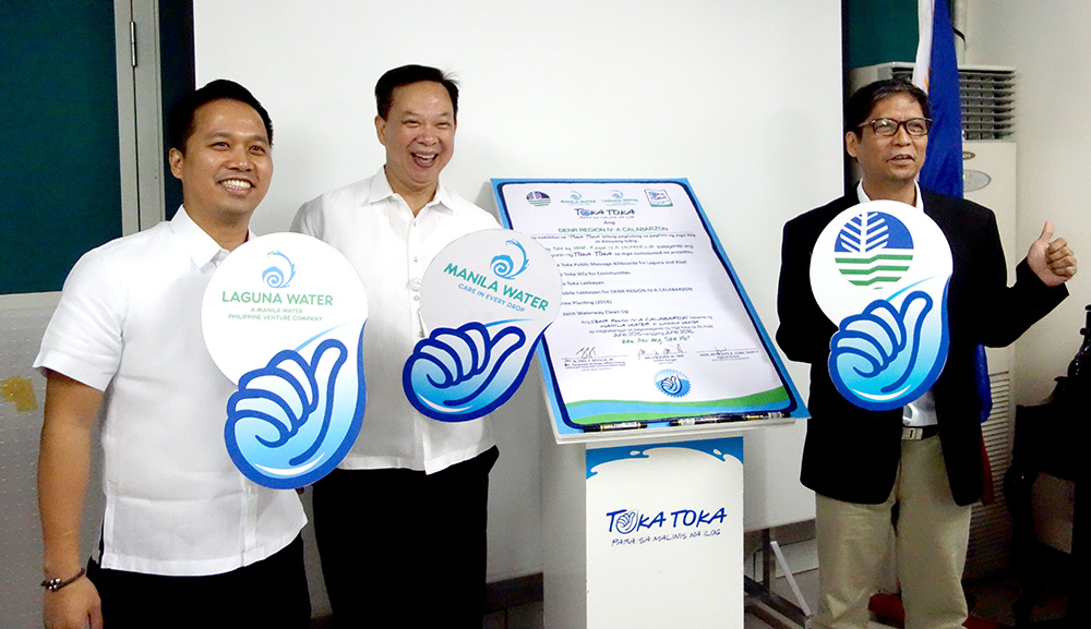 Photo shows (L-R): Laguna Water General Manager Melvin John Tan, Manila Water Branding and Market Research Head Fernando Busuego, and DENR-CALABARZON Regional Director Reynulfo Juan during the signing event.